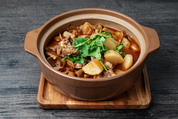 Premium Photo | Delicious stewed mutton with radish in casserole