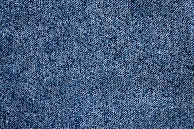 Premium Photo | Denim blue jeans texture close up background top view