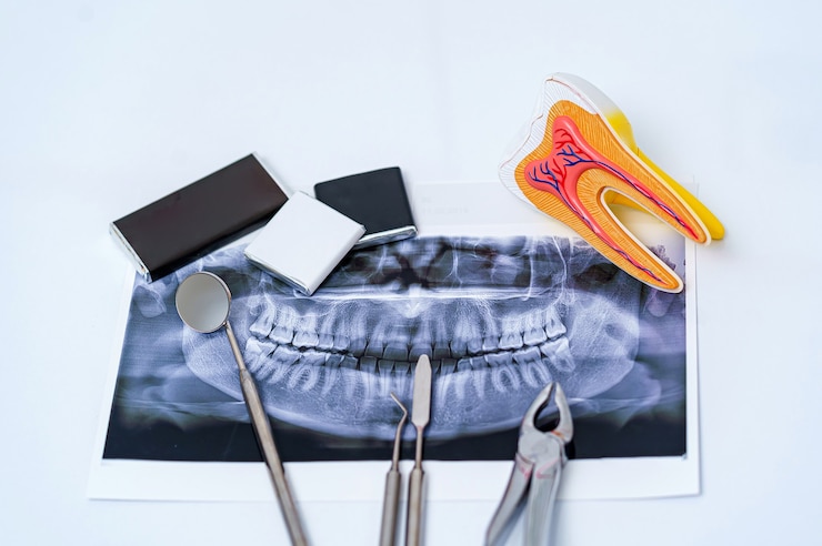  Dental instruments and jaw x-ray on white background. panoramic jaw x-ray on white background. Prem
