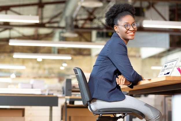 Premium Photo | Designer smiling. cheerful african-american interior ...