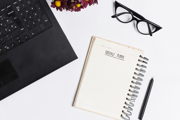 Desk workspace with various elements Free Photo