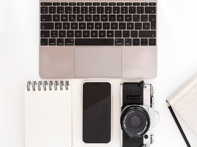 Free Photo | Desktop with laptop and mobile phone