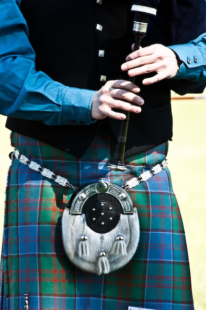 Premium Photo | Detail of a bagpipe exibition during highland games