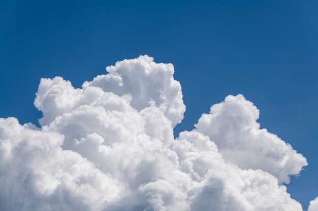 Premium Photo | Detail of white cumulus clouds on blue sky