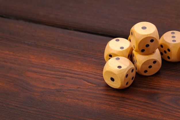 Premium Photo Dice On Wooden Table Background For Casino Games