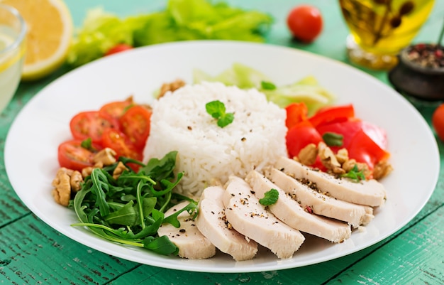 Premium Photo | Diet food. chicken breast with rice and vegetables