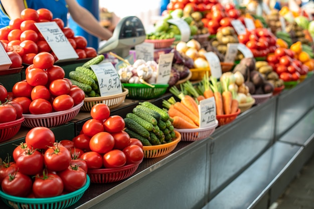 Different fresh vegetables in baskets on counter. Free Photo