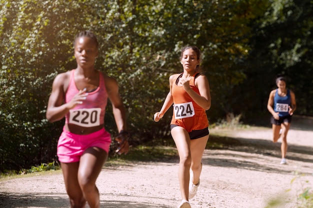 Free Photo | Different people participating in a cross country