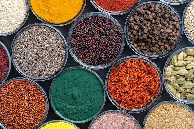 Premium Photo | Different spices and herbs on background, close up, top  view. assortment colorful spices, seeds and herbs for cooking food