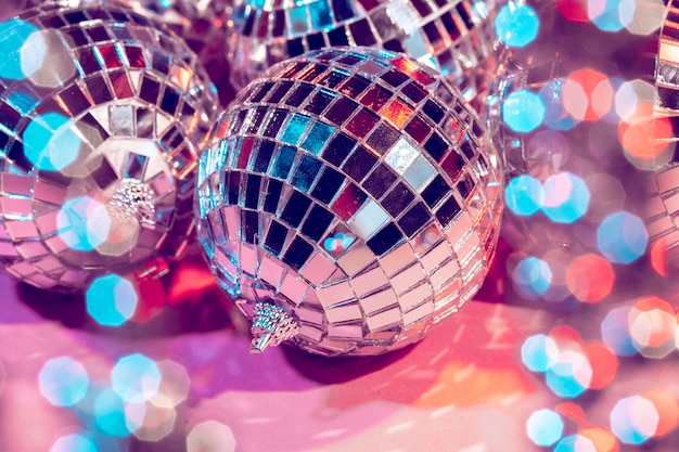 Premium Photo | Disco ball bauble on pink background. party