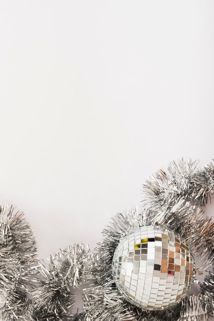 Disco Ball With Tinsel On Table Photo Free Download