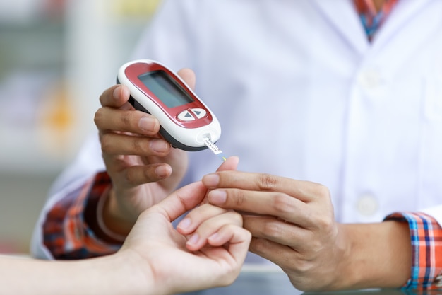 Premium Photo | Doctor checkup blood patient in clinic