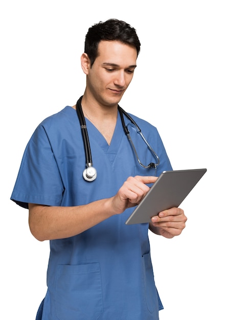 Premium Photo | Doctor using his tablet. isolated on white