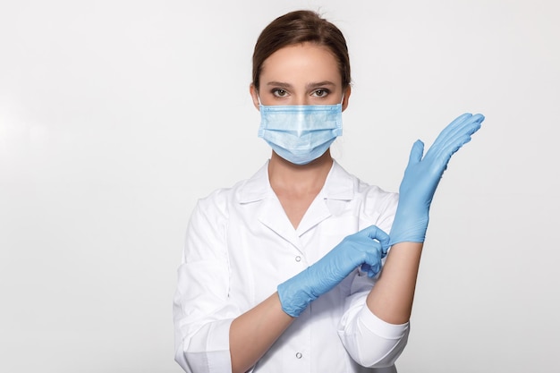 Premium Photo | Doctor wearing mask and gloves