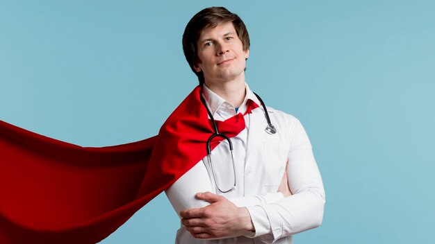 Free Photo | Doctor with coat and blue background