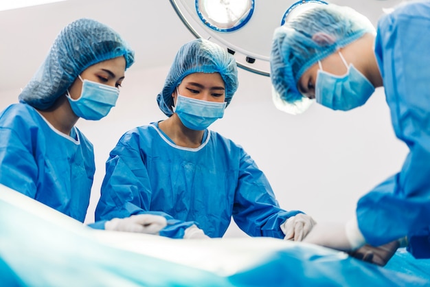 Premium Photo | Doctors in protective clothes at operating room