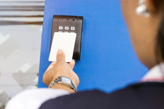 Door Access Control Young Woman Holding A Key Card To Lock And