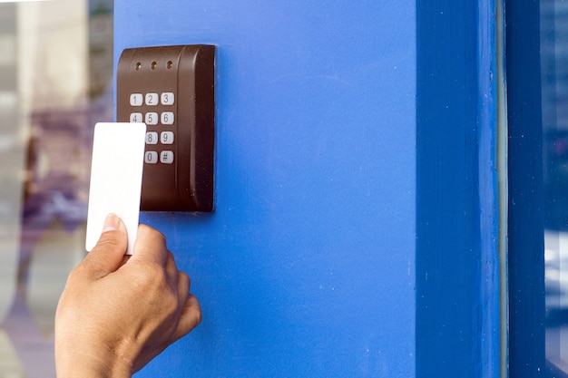 Door Access Control Young Woman Holding A Key Card To Lock