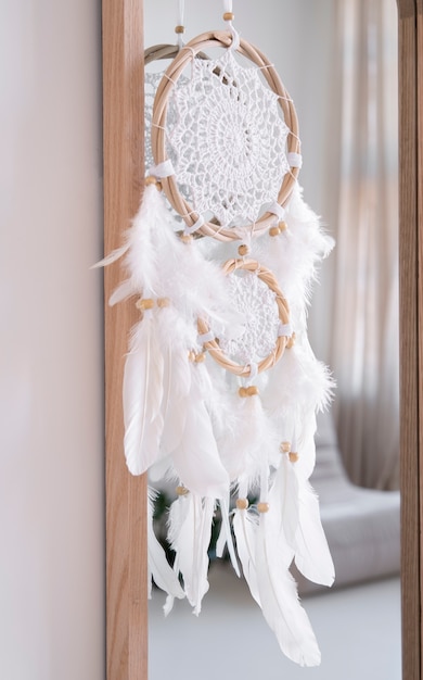 Free Photo | Dreamcatcher hanging from a mirror