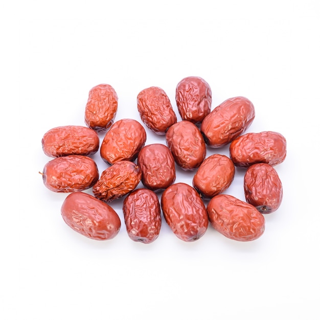 Dried chinese dates jujube on white background closeup free photo