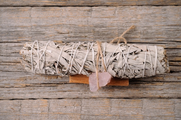 Premium Photo | Dried white sage smudge bundles on table