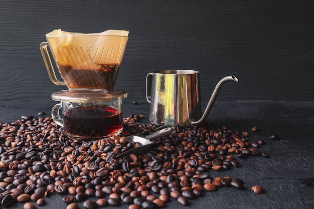 Premium Photo | Drip coffee cup and roasted coffee beans