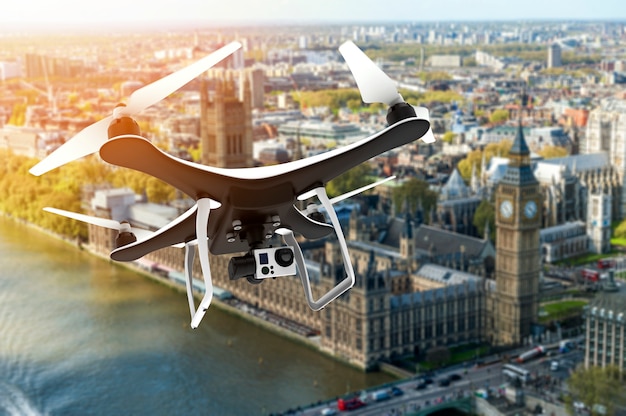 Premium Photo | Drone with digital camera flying over london