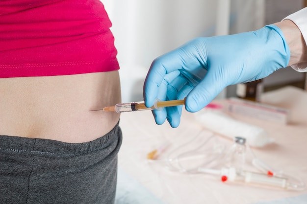 Premium Photo Drug Injection In The Buttock Made By A Doctor Specialist