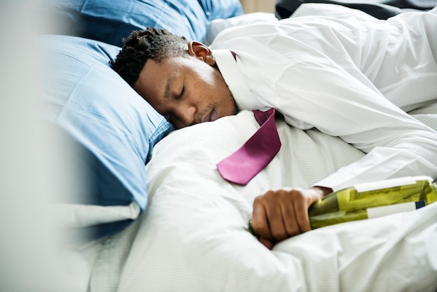 Premium Photo A Drunk Man Passing Out In Bed 