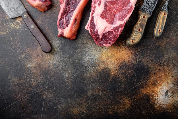 Premium Photo Dry Aged Raw Beef Meat Set Tomahawk T Bone Or