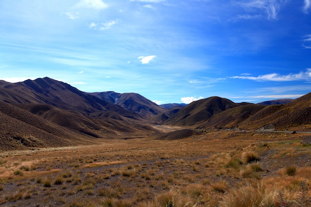 Premium Photo | Dry mountain range at lindis pass