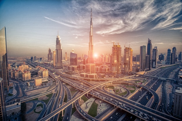 Dubai skyline in the evening about to sunset Premium Photo