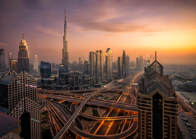 Dubai skyline at sunset Premium Photo