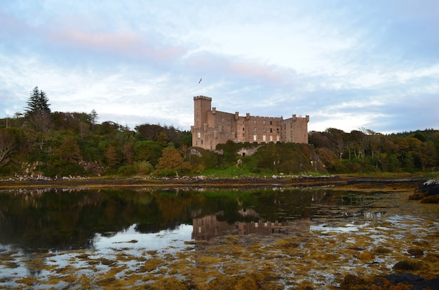 Free Photo | Dunvegan castle reflected in loch dunvegan.