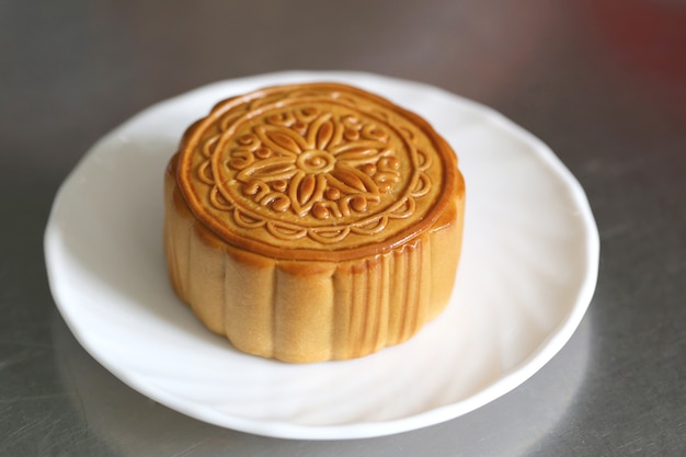 Premium Photo | Durian fruit of mooncake in white dish.