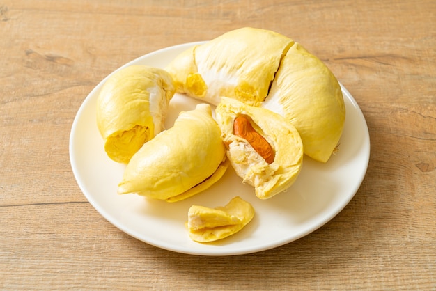 Premium Photo Durian Riped And Fresh Durian Peel On White Plate