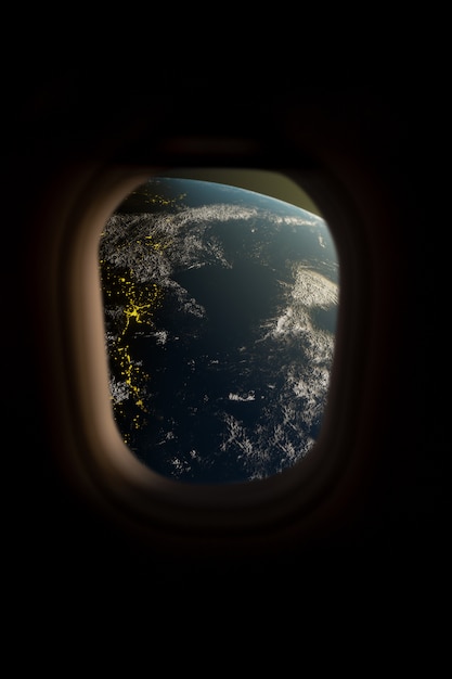 宇宙船の窓から見た地球 プレミアム写真