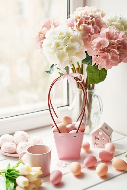 Premium Photo | Easter composition with pink and white hydrangeas in ...