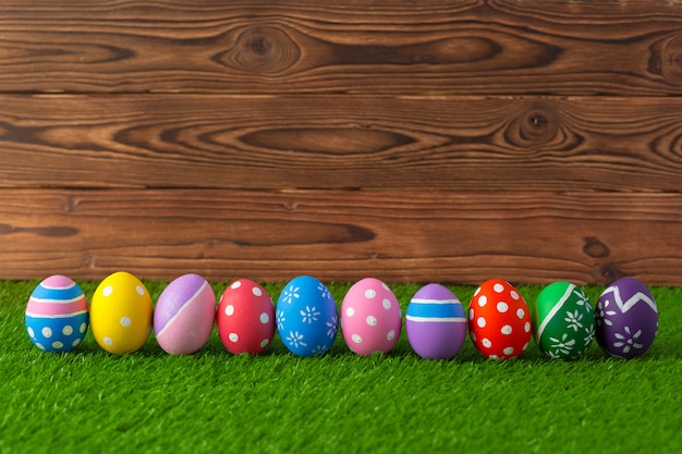 Premium Photo | Easter eggs on the grass