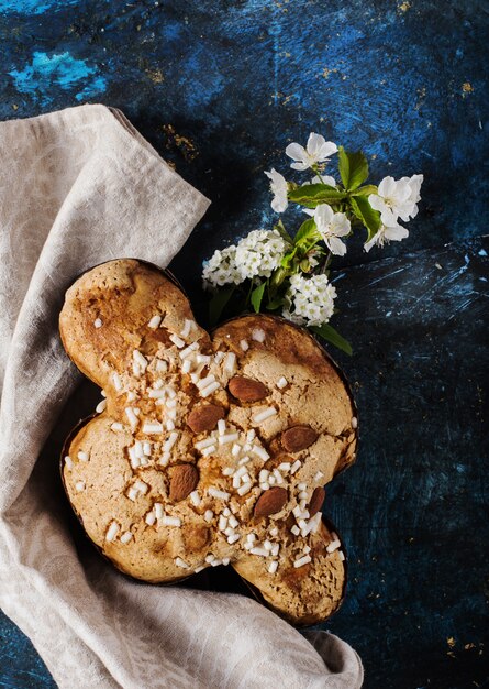 Premium Photo | Easter italian cake over blue rustic board