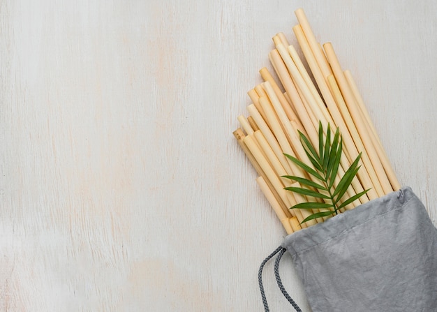 Premium Photo | Eco-friendly environment bamboo tube straws in a cute bag