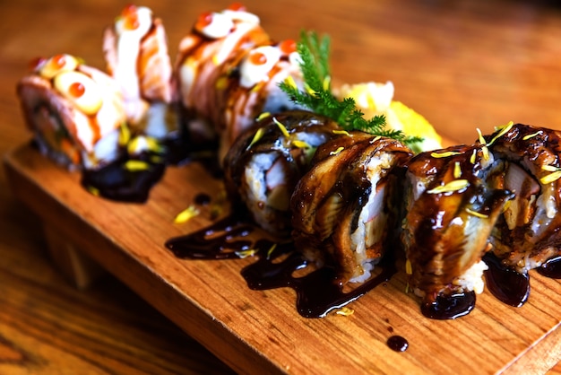 Eel And Salmon Sushi Rolls On Wooden Dish Beautiful Traditional