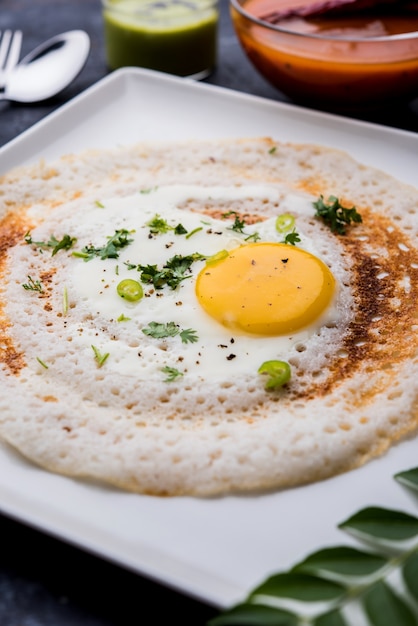 Premium Photo | Egg dosa is a popular south indian non-vegetarian