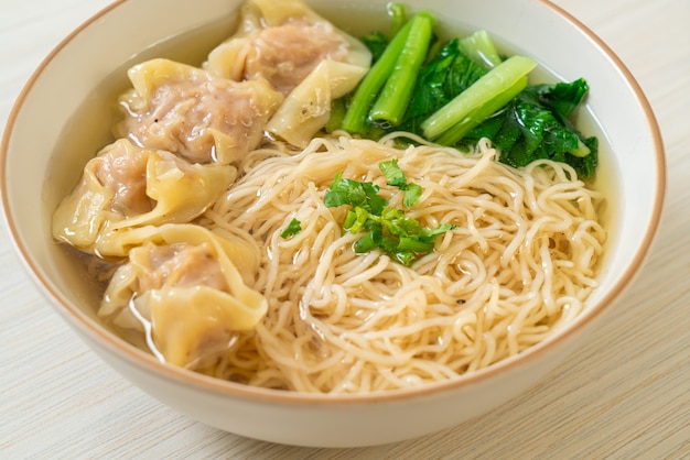 Premium Photo Egg Noodles With Pork Wonton Soup Or Pork Dumplings Soup And Vegetable Asian Food Style