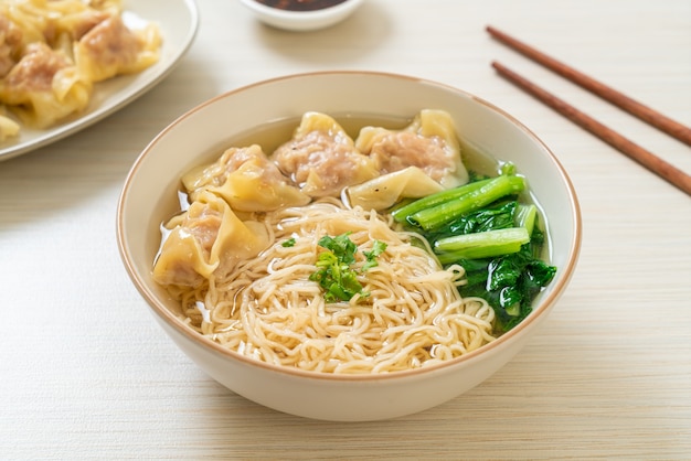 Premium Photo Egg Noodles With Pork Wonton Soup Or Pork Dumplings Soup And Vegetable Asian Food Style