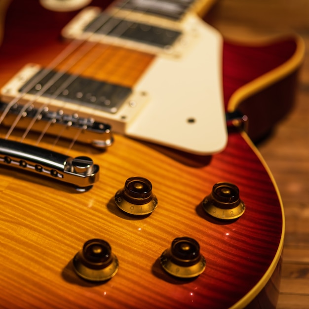 Free Photo Electric Guitar Body Close Up View Is On The Wood Floor