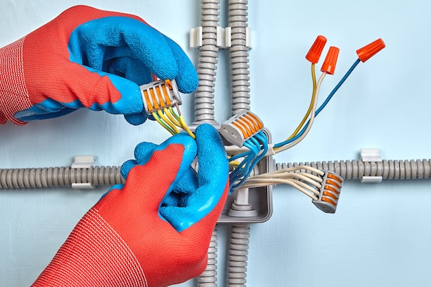 Premium Photo Electrician Is Mounting Electrical Junction Box With Twist Splice Wire Connectors