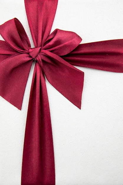 Elegant Burgundy Ribbon On White Background Photo | Free Download