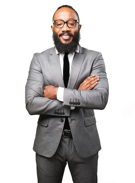 Elegant man in a suit and arms crossed Photo | Free Download