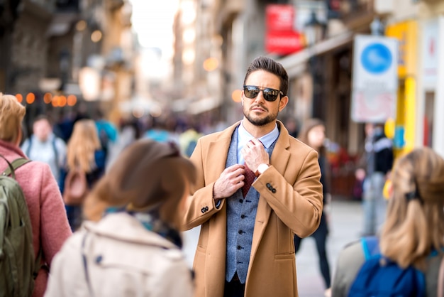 Premium Photo | An elegant man walking on the streets